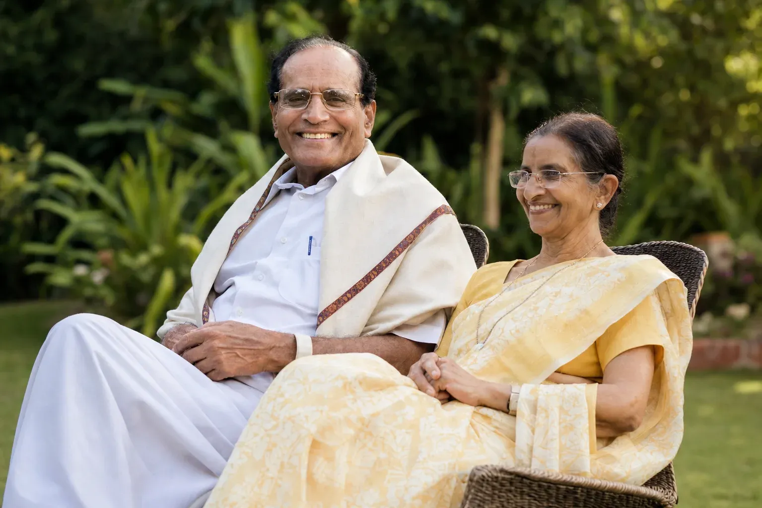 Late Dr. Kurunji Venkatramana Gowda seated in a garden with his wife