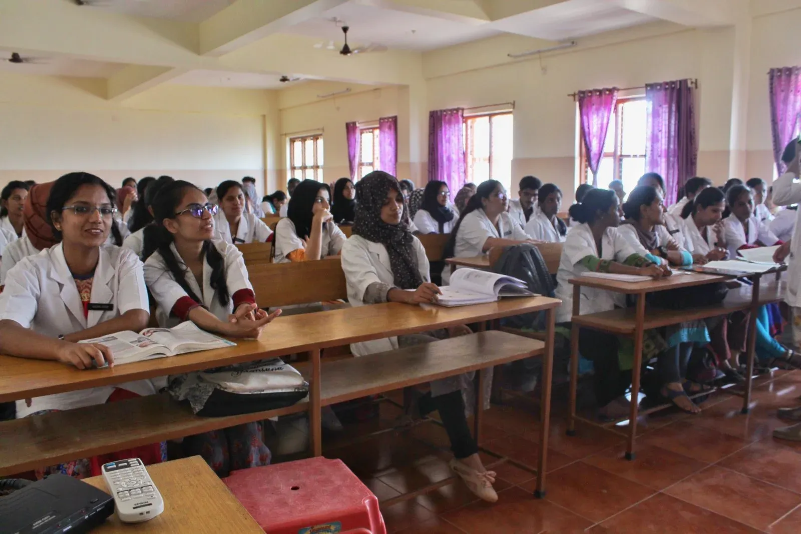 Students seated in a classroom at KVG Dental College