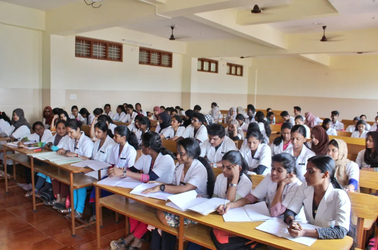 Classroom with tiered seating at KVG Dental College
